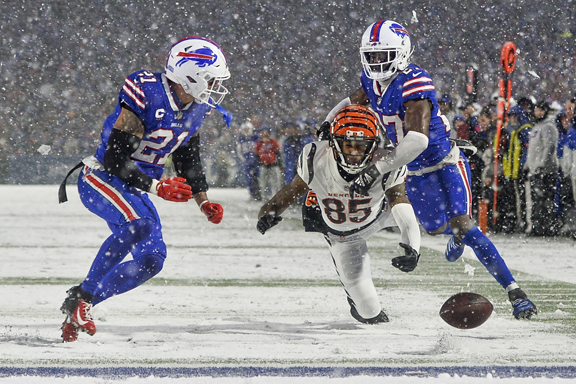 NFL playoffs: Bengals beat Buffalo in the snow 